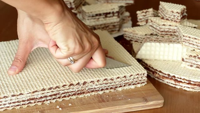 cutting pischinger, oblaten chocolate cake from Poland