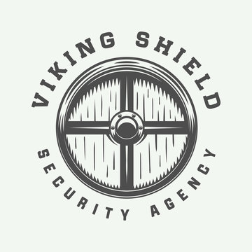 Vintage vikings shield. Can be used as logo, emblem, badge or print. Vector Illustration. Monochrome graphic art.