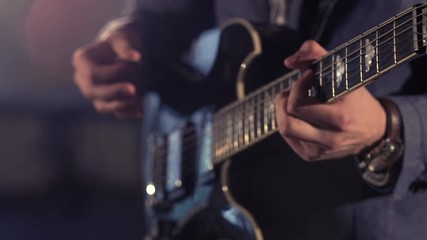 Musician playing guitar - Powered by Adobe