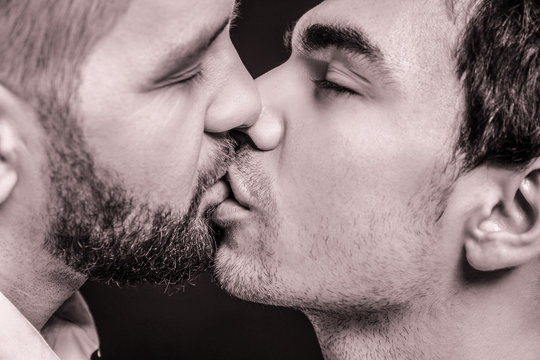 Man kissing another man