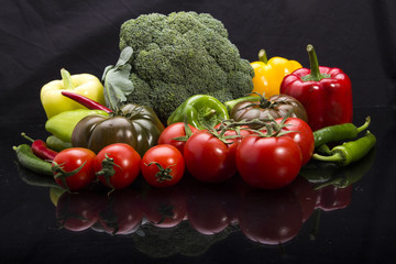 Colorful fruits and vegetables black arkapland
