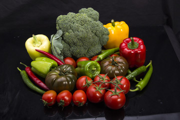 Colorful fruits and vegetables black arkapland