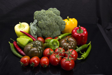 Colorful fruits and vegetables black arkapland