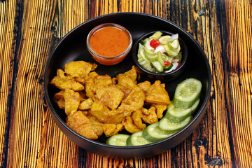 Charcoal boiled ,Pork satay served with side disk.