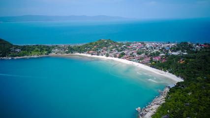 Naklejka na ściany i meble Aerial view from the drone on the taxi boats at the azure sand beach of Thailand,koh Phangan island,Haad Rin beach