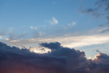 Fototapeta premium Clouds in blue sky after sunset