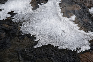 Snow flake beside River from snow ice melt on mountain Landscape view at Zero-Point, fog and mist weather day time