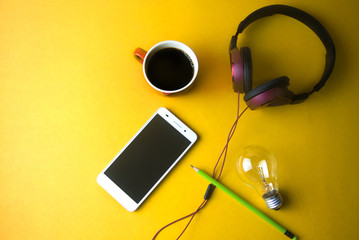 coffee with orange desk and business object on yellow ground