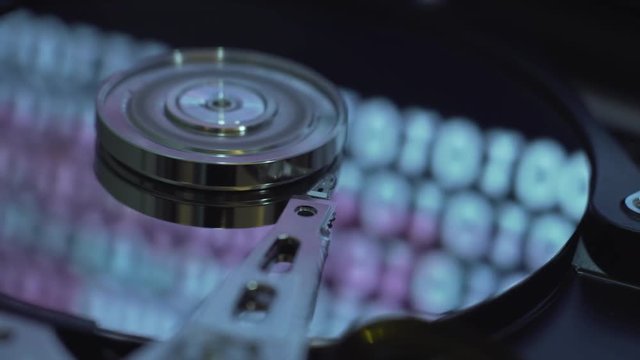 Hard Disk Drive, matrix screen in reflection.