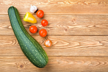 Set of ripe vegetables on a wooden background 