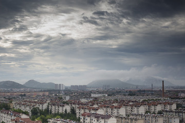 Fototapeta na wymiar Residential environment of Chinese buildings living environment mountain and urban cloud
