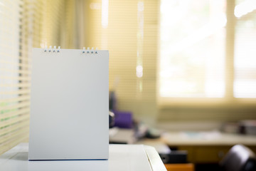 Blurred white calendar.