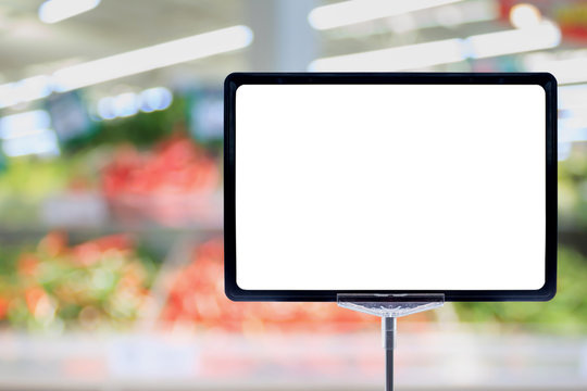 Blank price board sign display in Supermarket with fresh food abstract blurred background with bokeh light