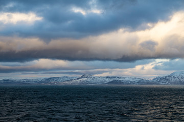 Dark Skies and Mountains off the Coast of Norway - 165255418