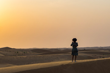 Desert Sunset in Dubai with Woman - 165256097