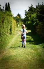 Fototapeta premium Little girl in park.