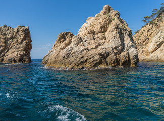 View from the sea on a beautiful rocky landscape on a sunny day