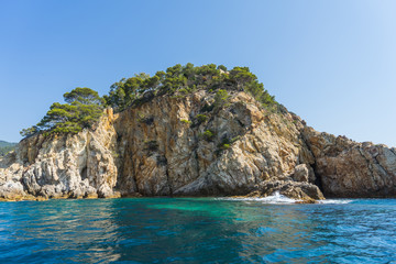 View from the sea on a beautiful rocky landscape on a sunny day