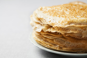 Stack of kefir (buttermilk) pancakes traditional for Russian pancake week