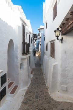 Narrow streets of the village in Menorca. Spain