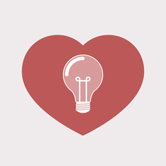 Isolated heart with a light bulb