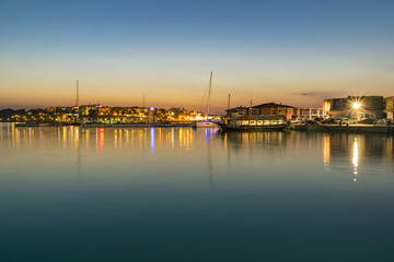 Fototapeta na wymiar Water reflection of city lights Nessebar