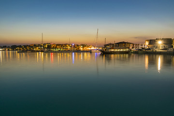 Obraz premium Water reflection of city lights Nessebar