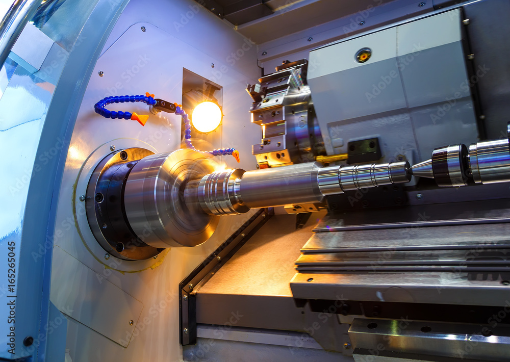 Poster metalworking cnc milling machine. cutting metal modern processing technology. small depth of field. 