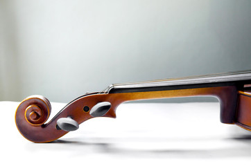 Obraz na płótnie Canvas The violin on white background for isolated, Close up of violin on white background for cut of, Top view of violin musical for isolated