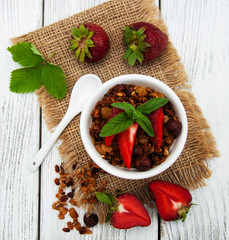 Homemade granola with strawberries
