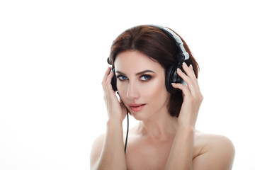 Naklejka premium Beauty portrait of adult adorable fresh looking brunette woman with gorgeous makeup dj headphones bob hairdo posing against isolated white background showing emotion and facial expression concept.