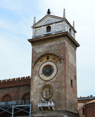Clock tower in Piazza delle Erbe square in Mantua, Italy