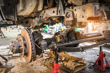 Closeup of the inside of the drive shaft of the car-Automotive industry and garage concepts.