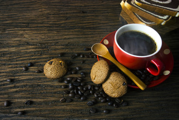 hot coffee with cookies and bread on wood ground top view