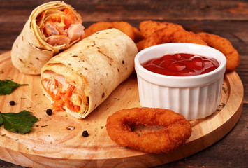 Shaurma with chicken with breaded onion rings