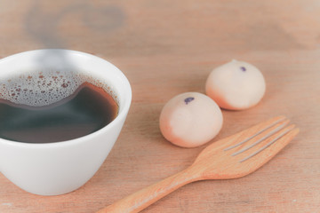 hot coffee mug on wood.