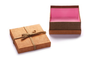 open and empty golden gift box with string ribbon bow isolated on white background