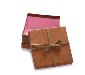 open and empty golden gift box with string ribbon bow isolated on white background