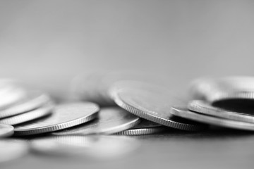 Row of coins on wood background for finance and Saving concept,Investment, Economy, Soft focus and dark style.