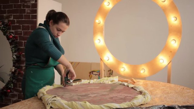 Girl creating decorative item