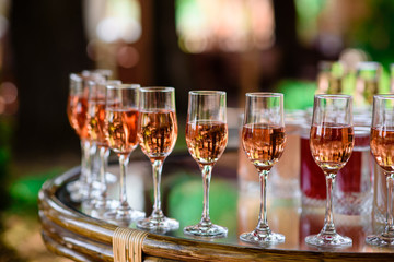 Glasses with wine.