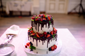 A beautiful cake with fresh berries.