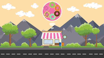 donuts store business on beside street with mountain view as background