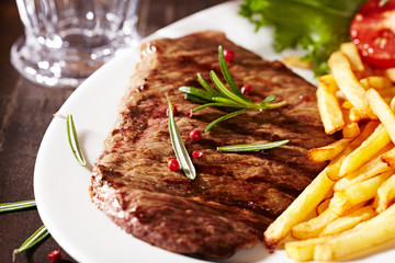 Grilled Pork with French Fries and Salad