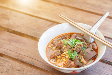Rice noodles with spicy pork sauce (Nam ngiao) is a noodle soup or curry of the cuisine of the Tai Yai people. thai food.