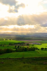 Fototapeta na wymiar sun ray over scotland landscape