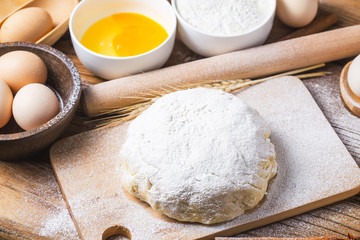 Dough preparation recipe bread, pizza or pie making ingridients, food flat lay on kitchen table background.