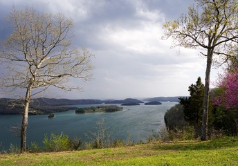 Lakefront Park Islands Dale Hollow State Resort fall evening before storm in Kentucky and Tennessee border lodge patio Overlook of Mountain lake trees with very colorful foreground and background