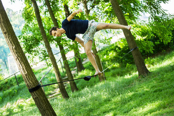 young guy on slack line