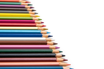 Colored pencils on white background